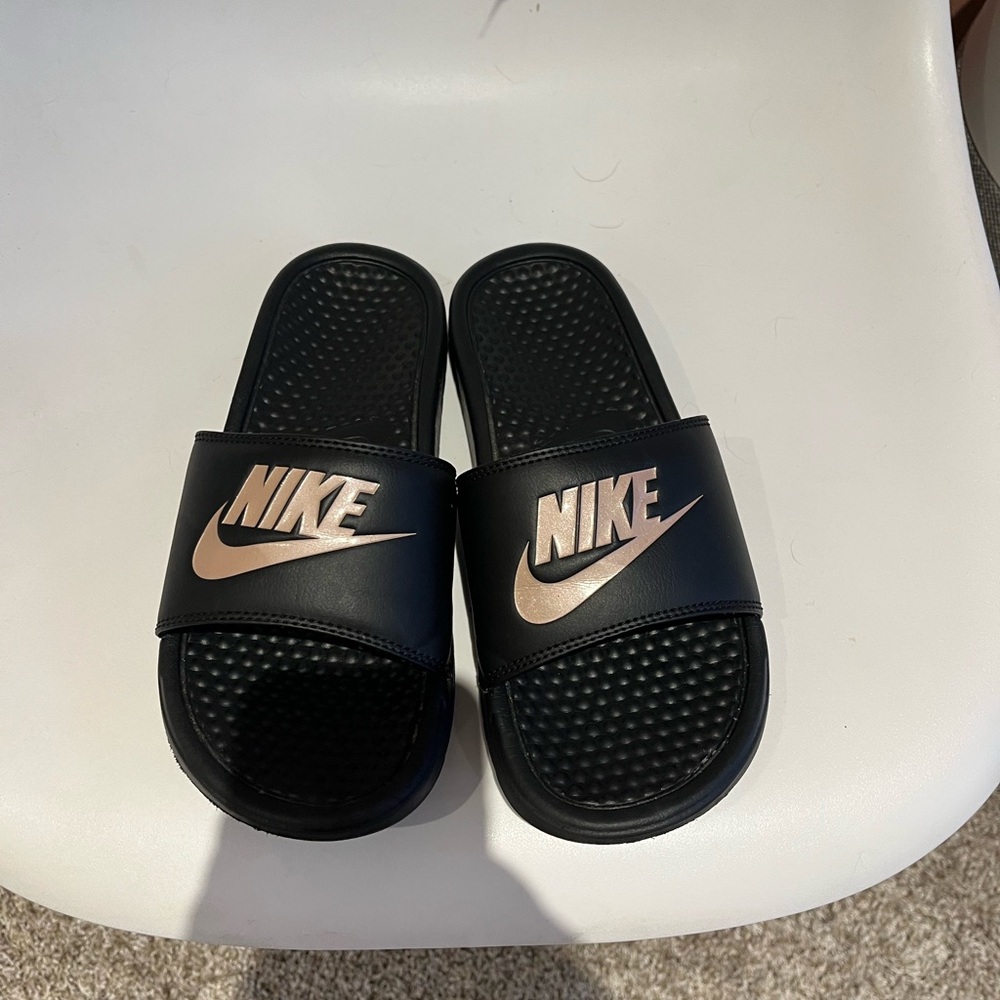 Nike Benassi black slides with pink logo